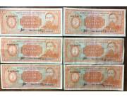 Vendo billetes color naranja de cien guaraníes paraguay