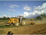 limpieza de terrenos con tractor y rotative , rastra pesada......