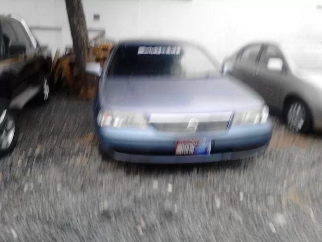 Nissan Sunny 2004 — foto 3