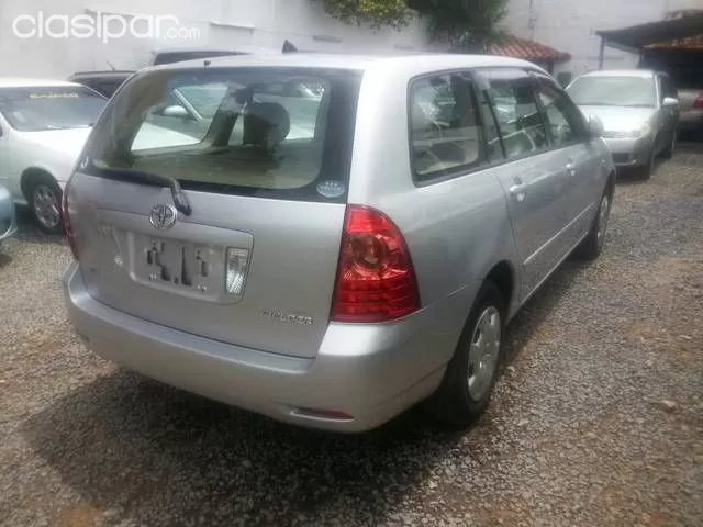 Toyota Corolla 2004 — foto 6