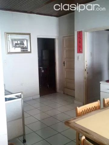 Sobre Pettirossi. Al frente Salón con altillo y depósito, arriba departamento y atrás edificio de 4 pisos — foto 2