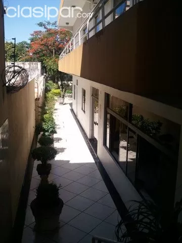 Sobre Pettirossi. Al frente Salón con altillo y depósito, arriba departamento y atrás edificio de 4 pisos — foto 3
