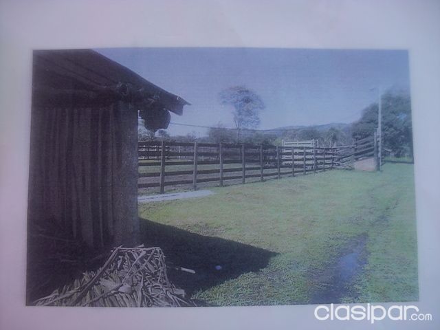 VENDO TERRENO CON CASA Y CAMPO SOBRE RUTA — foto 2