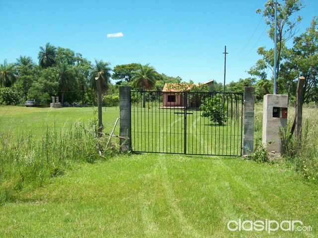 vendo 4 terren0s c0n titulo en Ypakarai c0n casa incluido — foto 2