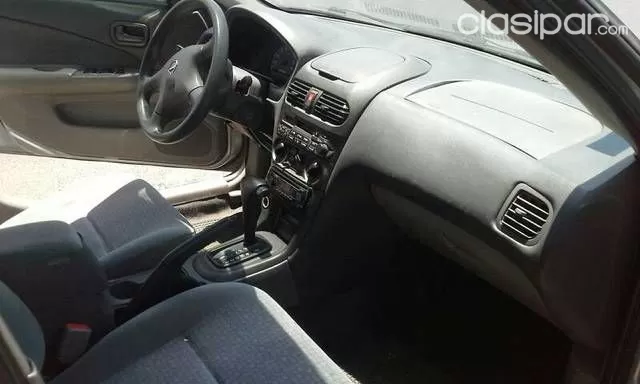 Nissan Sunny 2004 — foto 6