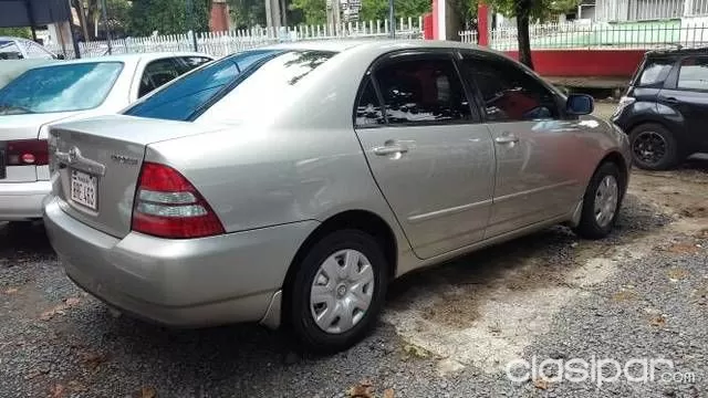 Toyota Corolla 2003 — foto 3
