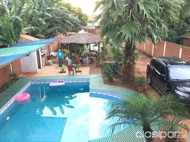 VENDO HERMOSO TERRENO CON CASA EN PLENO CENTRO DE ENCARNACION,A CINCO CUADRAS DE LA PLAYA SAN JOSE Y LA COSTANERA...!!!!!!!!!!!! — foto 3