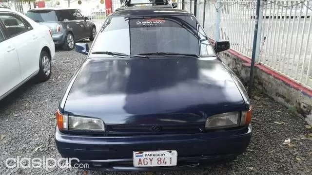 Mazda 323 1997 — foto 6