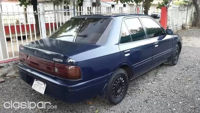 Mazda 323 1997 — foto 3