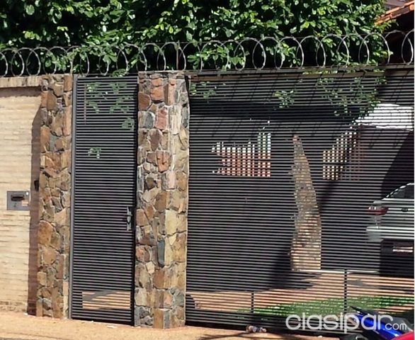 Valorice su Terreno. Construimos murallas de 2mts de altura con reja incluido Ladrillo visto en el frente o decorado con Piedra W — foto 2