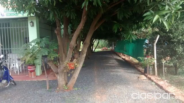 CASA TIPO COMERCIAL Y VIVIENDA, SOBRE RUTA ACCESO SUR EN GUARAMBARE, RECIBO VEHÍCULO. — foto 3