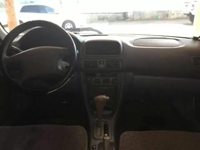 Toyota Corolla 1999 — foto 4