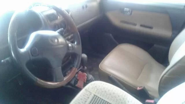 Toyota Duet 2003 — foto 3