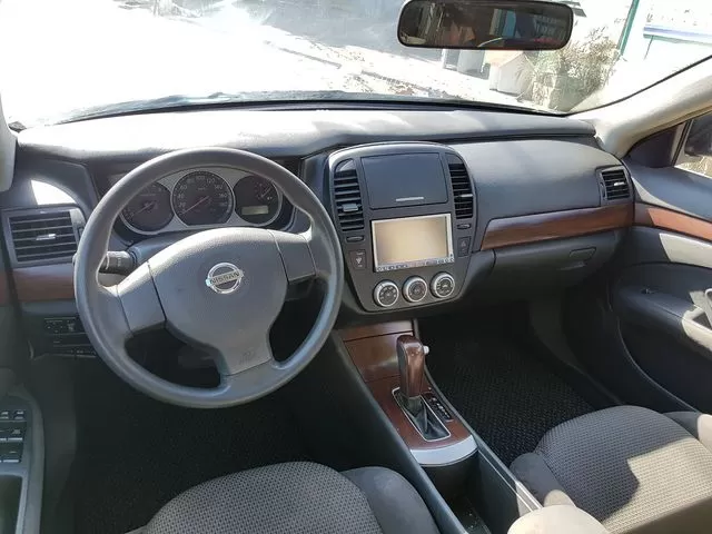 Nissan Bluebird 2006 — foto 4