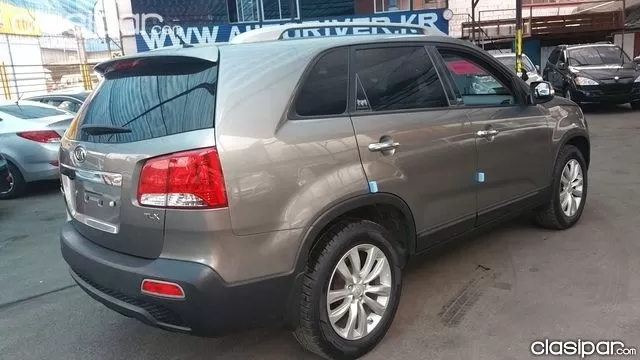 Kia Sorento 2010 — foto 4