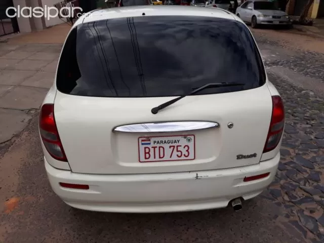 Toyota Duet 2001 — foto 5