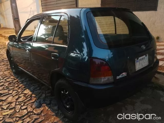 Toyota Starlet 1998 — foto 4
