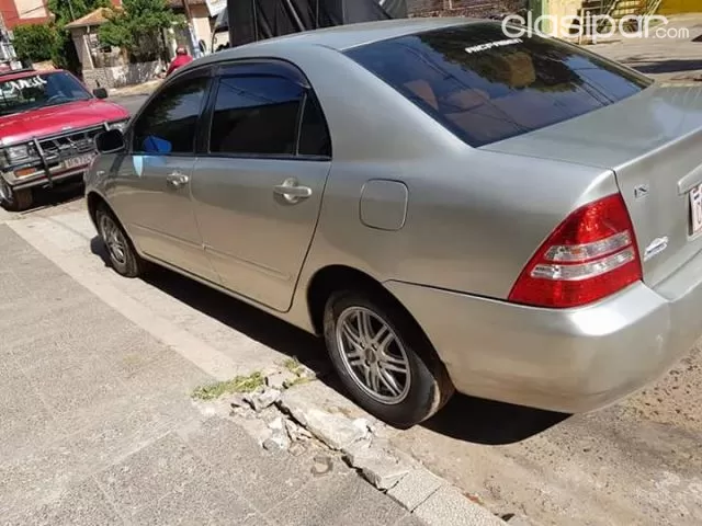 Toyota Corolla 2003 — foto 3