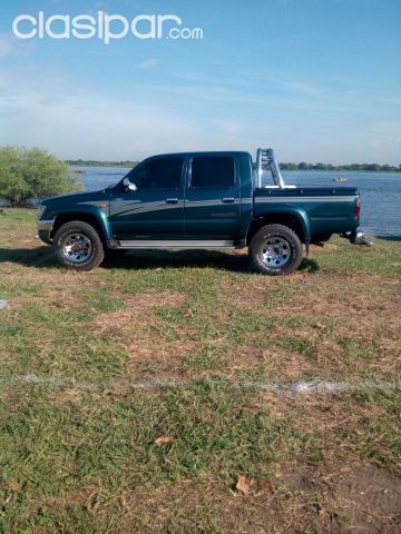 Camioneta Toyota Hilux 4x4 año 2000 color verde #1113663  en  Paraguay