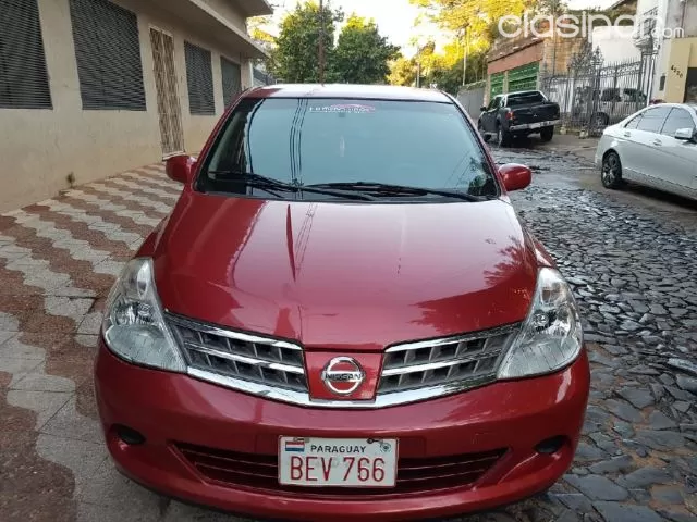Nissan Tiida 2009 — foto 4