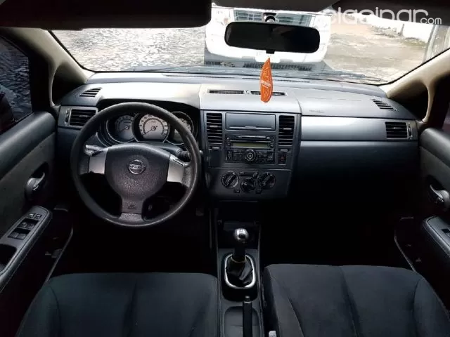 Nissan Tiida 2009 — foto 6