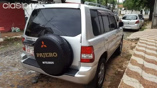 Mitsubishi Pajero Io 2001 — foto 5