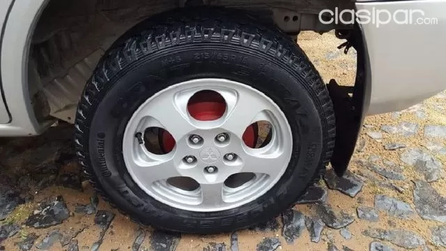 Mitsubishi Pajero Io 2001 — foto 6