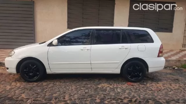Toyota Corolla 2002 — foto 4