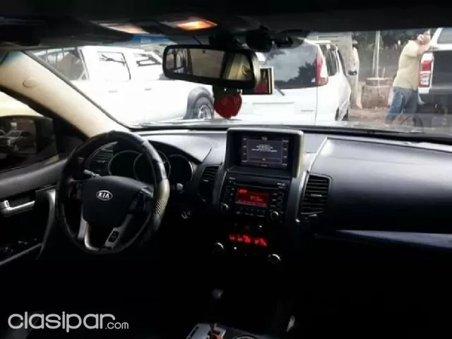 Kia Sorento 2011 — foto 4