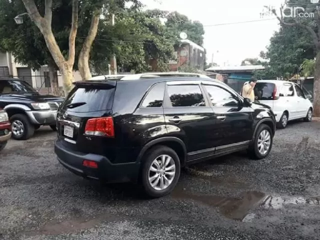 Kia Sorento 2011 — foto 6