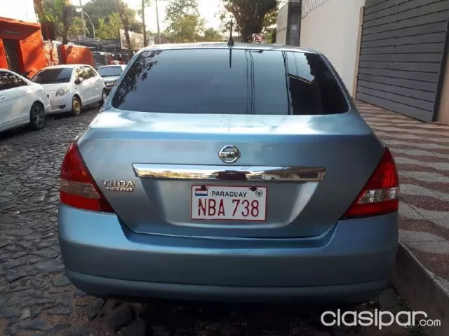 Nissan Tiida 2006 — foto 3