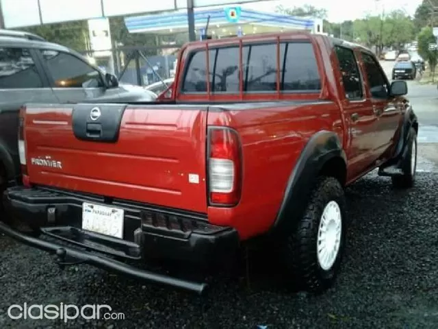Nissan Frontier 2004 — foto 3