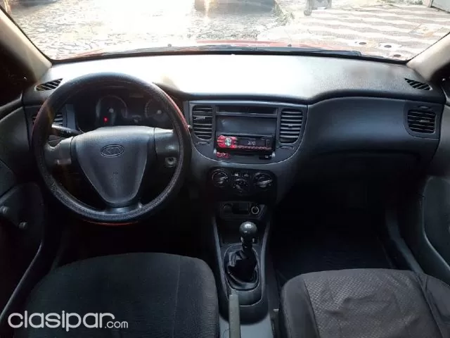 Kia Rio 2010 — foto 6