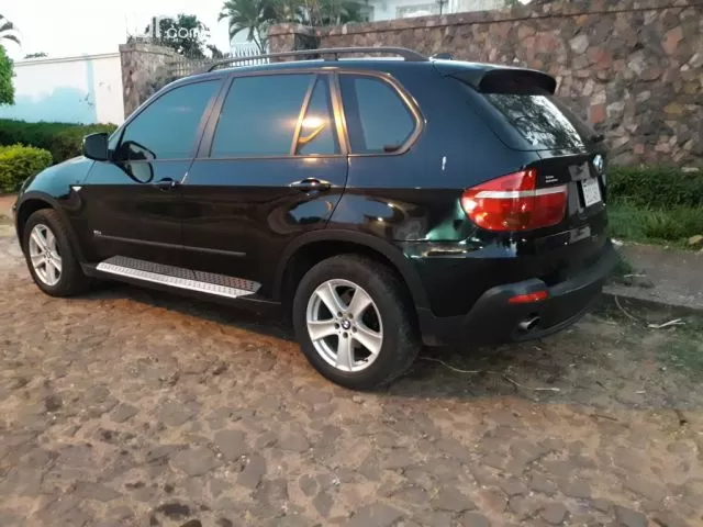 Bmw X5 2009 — foto 3
