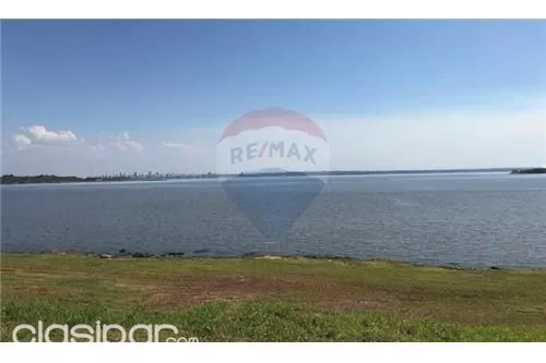 VENDO HERMOSO TERRENO SOBRE RUTA 1 CON PLAYA PRIVADA ENCARNACION — foto 2