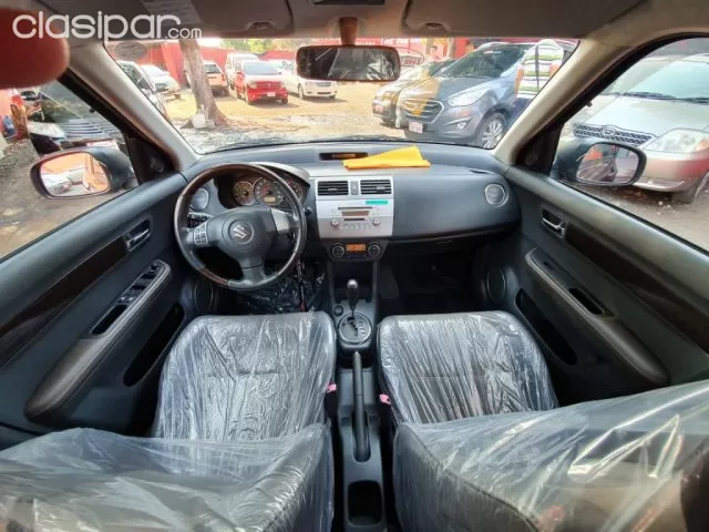 Suzuki Swift 2007 — foto 7