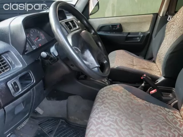 Mitsubishi Pajero Io 2000 — foto 5