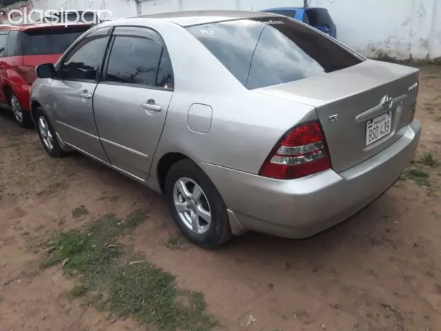 Toyota Corolla 2004 — foto 3