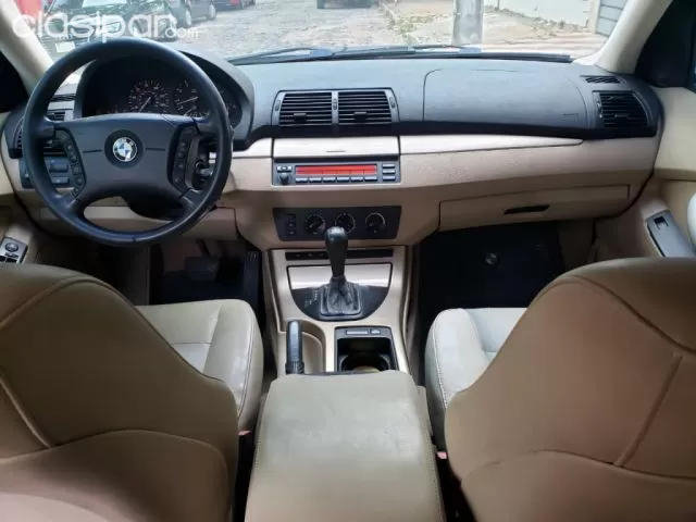 Bmw X5 2004 — foto 7