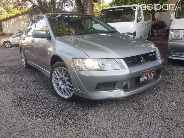 Mitsubishi Lancer 2002 — foto 4
