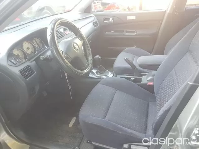 Mitsubishi Lancer 2002 — foto 6