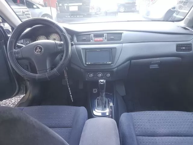 Mitsubishi Lancer 2002 - foto 8