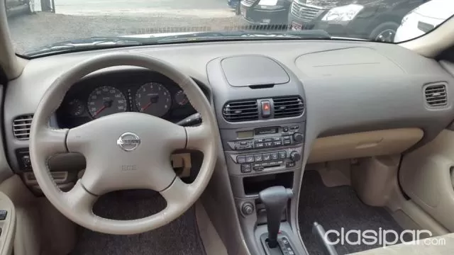 Nissan Sunny 2004 — foto 5