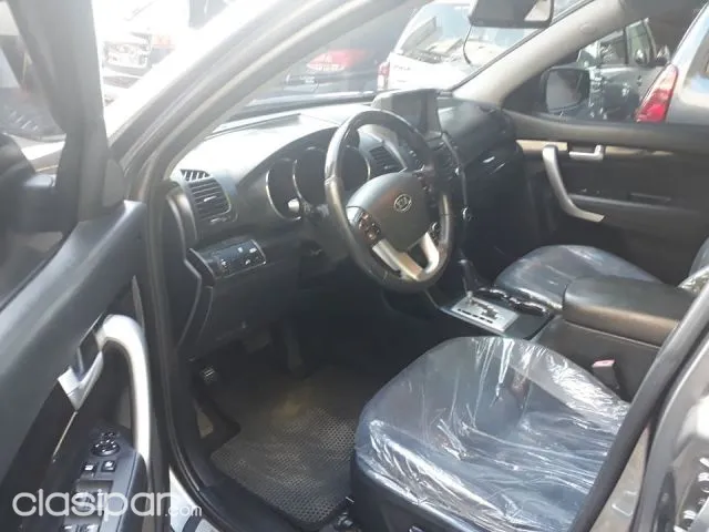Kia Sorento 2011 — foto 6