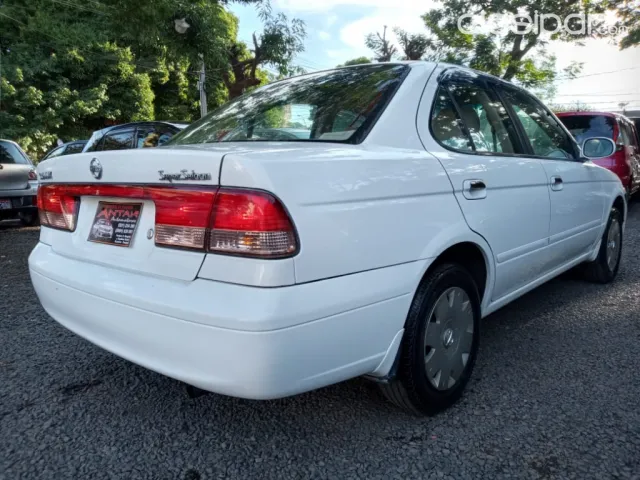 Nissan Sunny 2004 — foto 5