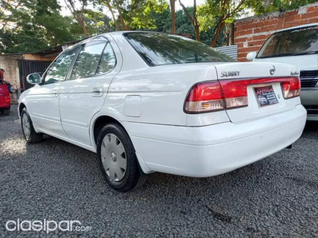 Nissan Sunny 2004 — foto 7