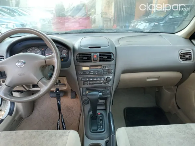 Nissan Sunny 2004 — foto 8