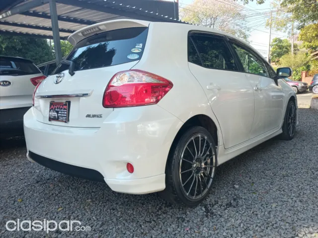 Toyota Auris 2010 — foto 7