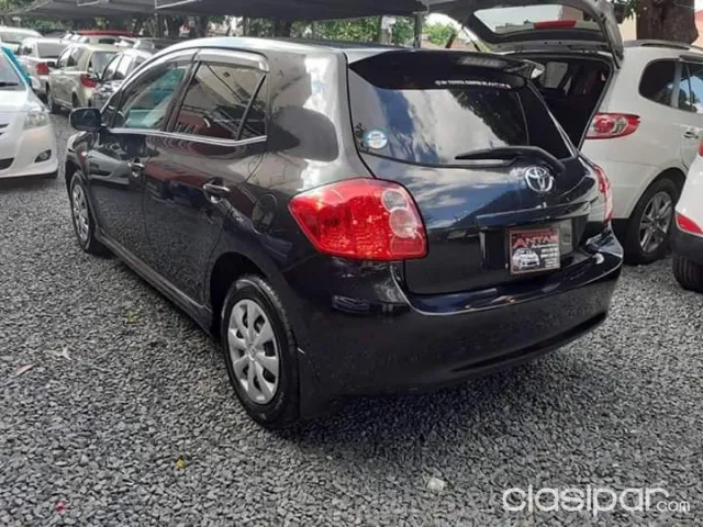 Toyota Auris 2009 — foto 4