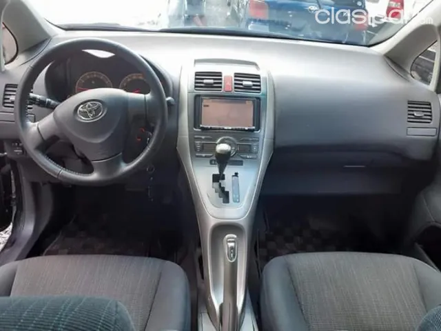 Toyota Auris 2009 — foto 6